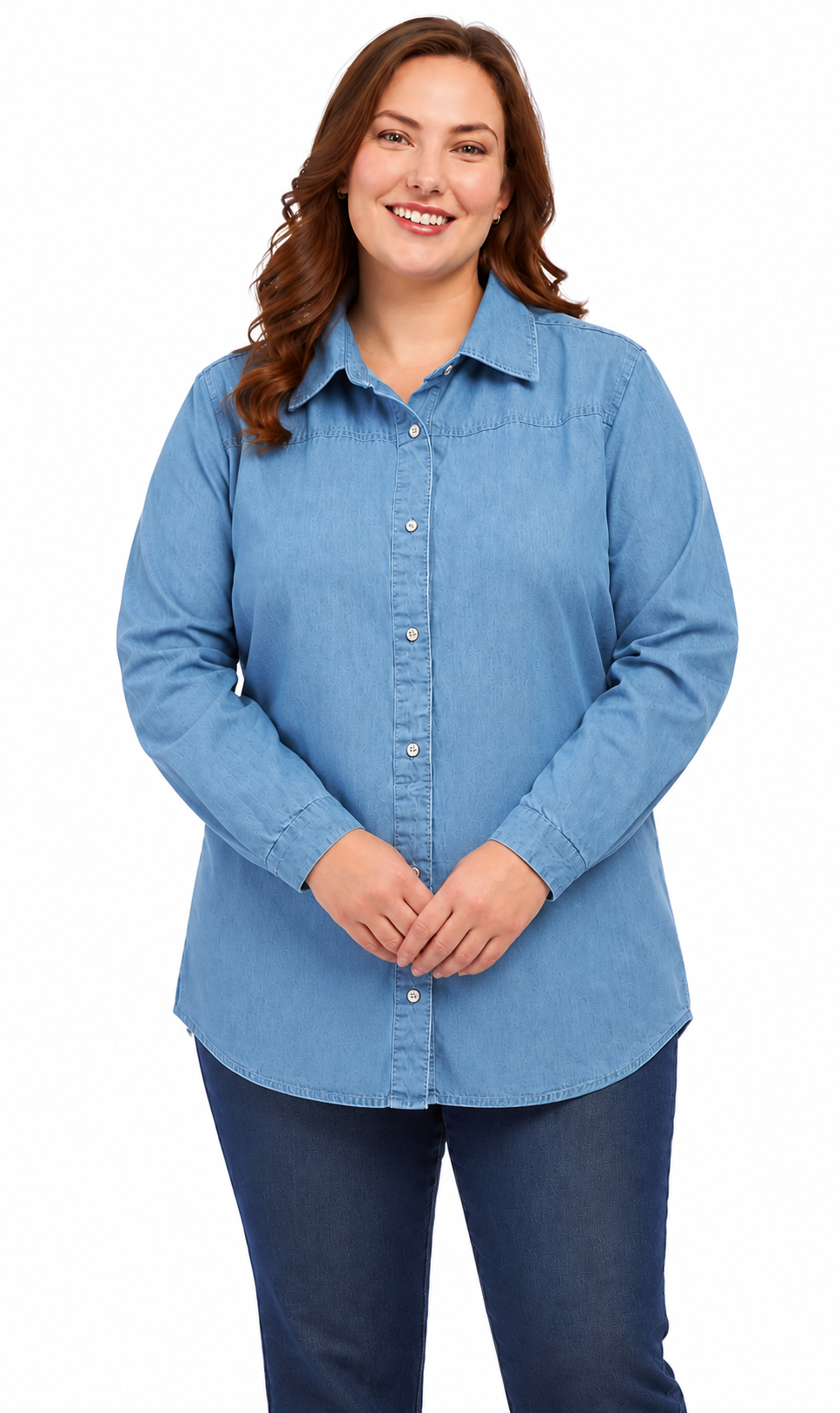 A woman modeling a light blue long-sleeve button-up shirt with dark blue jeans, standing against a plain white background.