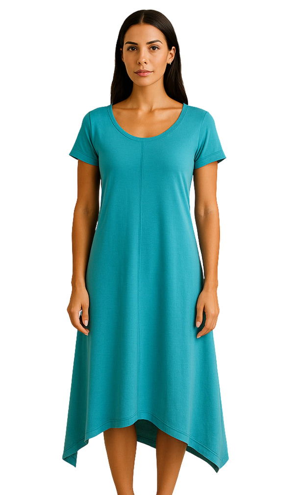 Woman wearing a teal dress on a white background